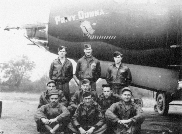 Standing from left 1/Lt. Robert L. Stevenson (Co-Pilot); Captain Albert L. Caney (Pilot); Captain J.B. Watzlawick (Bombardier/Navigator). Second row, from left: T/Sgt. Joseph Hough (Radio); S/Sgt. Dennis E. Coffman (Engineer); S/Sgt. Clifford Bates (Gunner). Front row, from left: S/Sgt. Nathan Singer (Armorer); M/Sgt. Frederick E. Toomey (Line Chief); Sgt. Oakley F. Kidwell (Assistant Crew Chief)