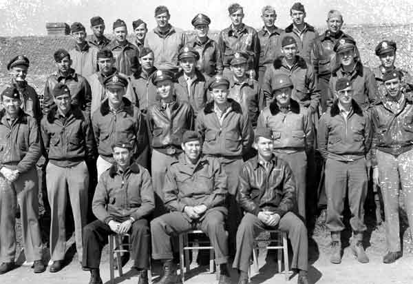 Members of the original cadre on the second anniversary of the formation of the 323rd Bomb Group. Lessay, France, 11 Sept. 1944.